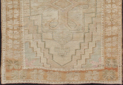 Oushak Vintage Rug with Pastel Colors in Tan, Brown, Butter, Peach, Lt. Blue. Light color Vintage Oushak rug with Central Medallions in Faded colors and medallion geometric design. Rug EN - 179021, country of origin / type: Turkey / Oushak, circa... - Keivan Woven ArtsEN - 179021 - 12541Rug