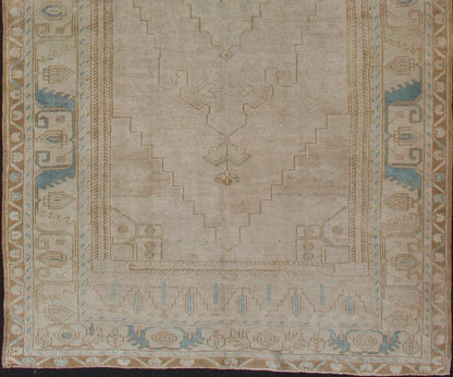 Gallery Runner Turkish Rug in Earth Tones & Light Blue With Medallion Rug / EN - 179024, Keivan Woven Arts / country of origin / type: Turkey / Oushak, circa 1940. Large Gallery Turkish rug in Earth tones, light brown with medallions. Turkish Gall... - Keivan Woven ArtsEN - 179024 - 11976Rug