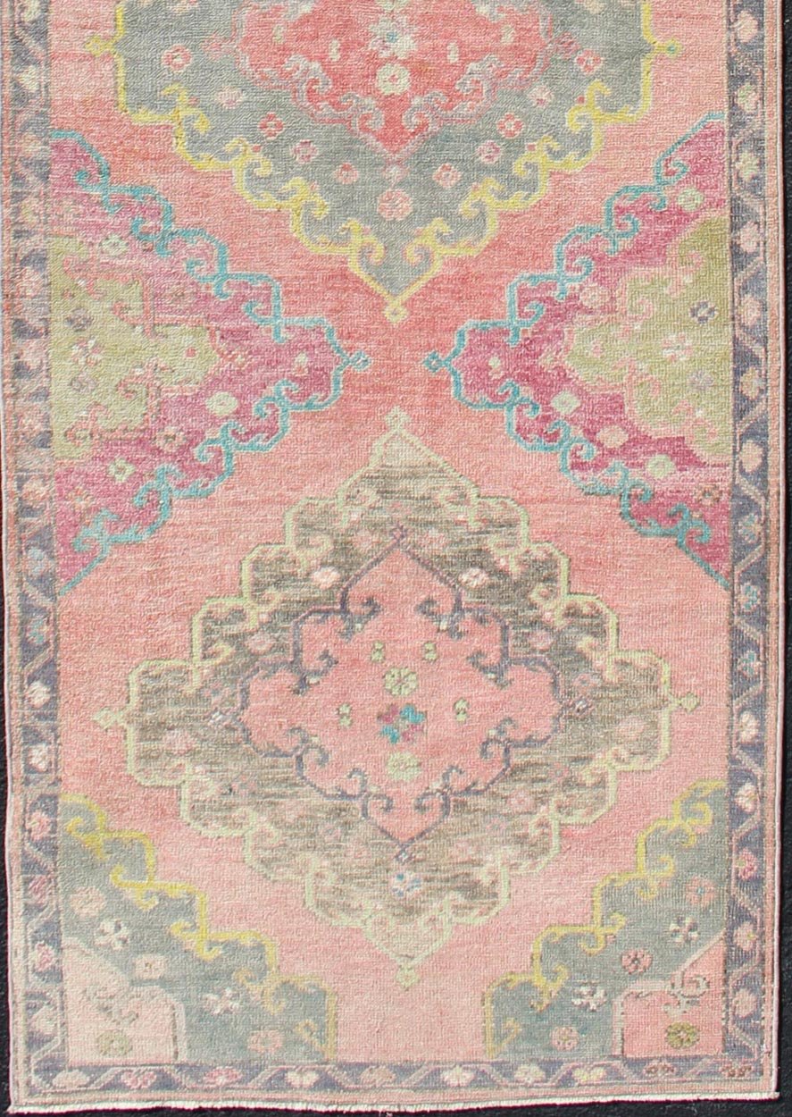 Colorful Vintage Turkish Oushak Runner with Four Medallion Design in Muted Colors. Measures: 3'4 x 12'3. This vintage Turkish Oushak runner features four layered medallions expanding across the central field. The surrounding border featu... - Keivan Woven ArtsEN - 179063 - 12349Rug