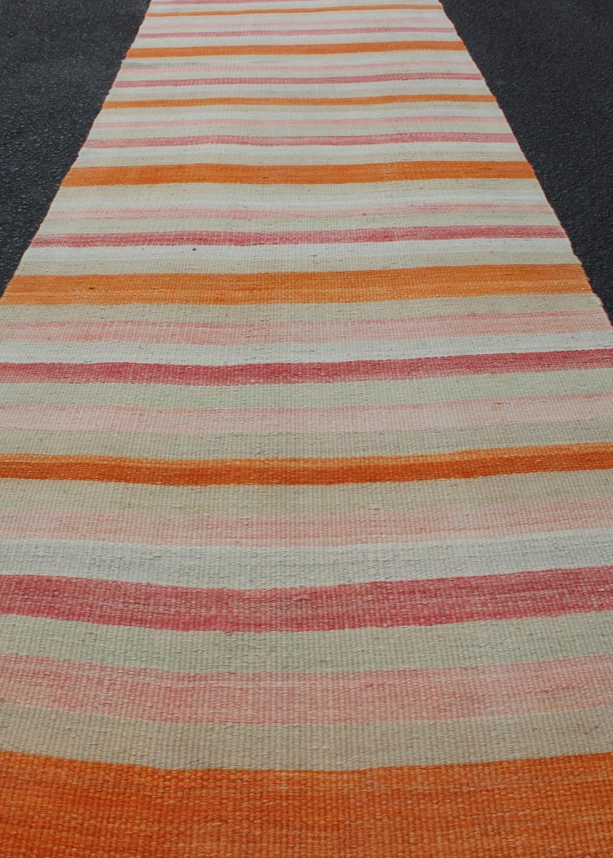 Vintage Kilim Runner Turkish in Multi Color in Stripe Design Multicolored vintage Turkish Kilim rug with horizontal stripes in orange, taupe, ivory, charcoal, and rust. Keivan Woven Arts / rug/EN - 179071, country of origin / type: Turkey / Kilim,... - Keivan Woven ArtsEN - 179071 - 11980Rug