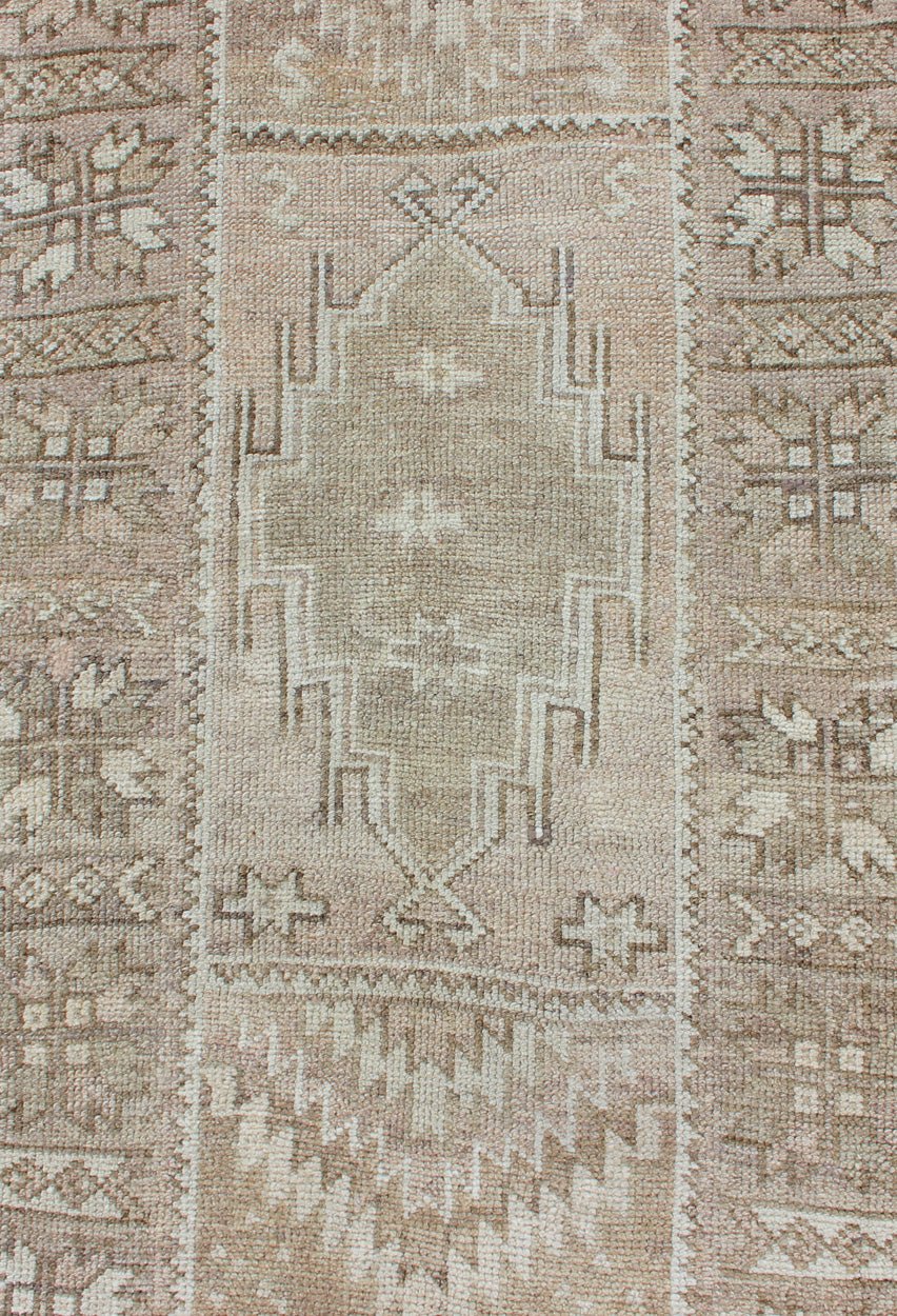 Long Vintage Turkish Oushak Runner with Medallions in Earth Tones. Keivan Woven Arts - Vintage Oushak carpet with multi - medallion design in cream, taupe, light brown and earth tones, rug EN - 179084, country of origin / type: Turkey / Oushak, circa 195... - Keivan Woven ArtsEN - 179084 - 12755Rug