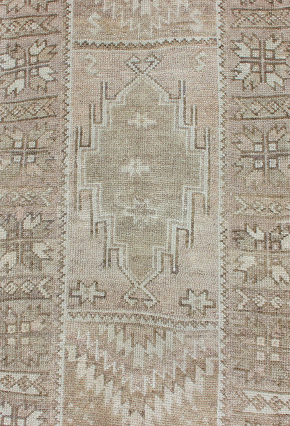 Long Vintage Turkish Oushak Runner with Medallions in Earth Tones. Keivan Woven Arts - Vintage Oushak carpet with multi - medallion design in cream, taupe, light brown and earth tones, rug EN - 179084, country of origin / type: Turkey / Oushak, circa 195... - Keivan Woven ArtsEN - 179084 - 12755Rug
