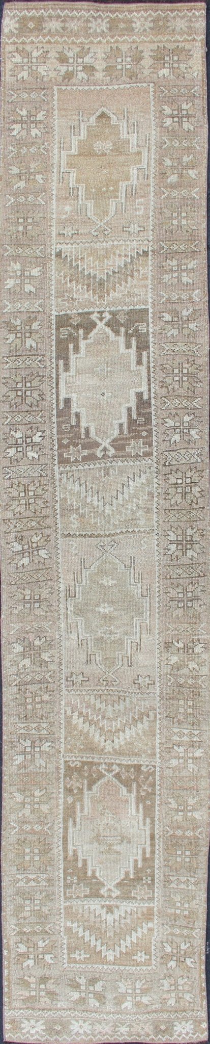 Long Vintage Turkish Oushak Runner with Medallions in Earth Tones. Keivan Woven Arts - Vintage Oushak carpet with multi - medallion design in cream, taupe, light brown and earth tones, rug EN - 179084, country of origin / type: Turkey / Oushak, circa 195... - Keivan Woven ArtsEN - 179084 - 12755