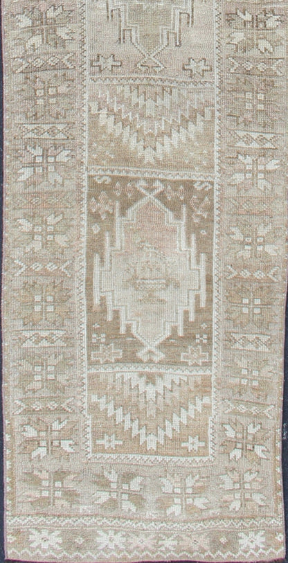 Long Vintage Turkish Oushak Runner with Medallions in Earth Tones. Keivan Woven Arts - Vintage Oushak carpet with multi - medallion design in cream, taupe, light brown and earth tones, rug EN - 179084, country of origin / type: Turkey / Oushak, circa 195... - Keivan Woven ArtsEN - 179084 - 12755Rug