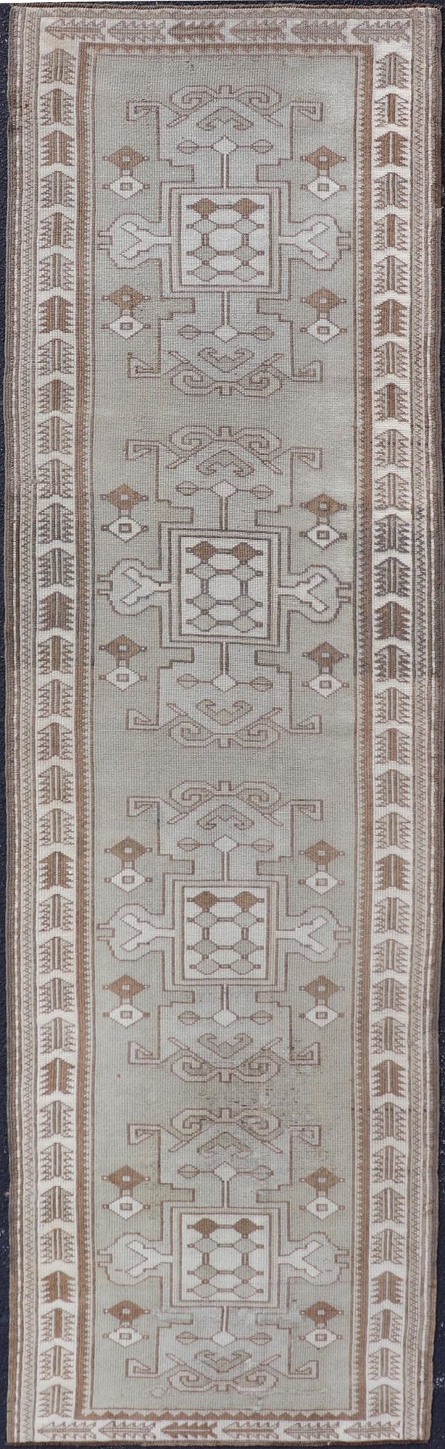 Measures: 2'10 x 10'0 Vintage Turkish Oushak Runner in Neutral Tones, Taupe, Gray, Cream, and Brown. Keivan Woven Arts / rug EN - 179108, country of origin / type: Turkey / Oushak, circa mid - 20th. This vintage Oushak carpet from mid - 20th century T... - Keivan Woven ArtsEN - 179108 - 21943Rug