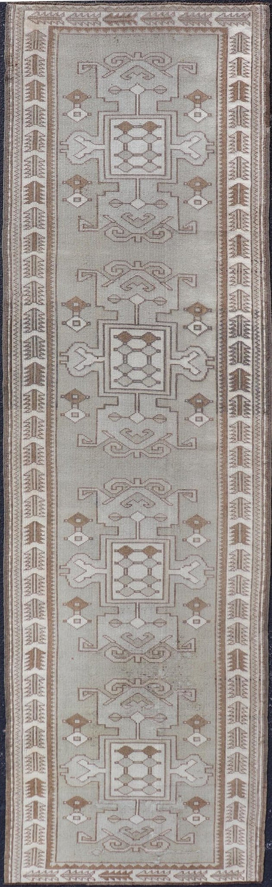 Measures: 2'10 x 10'0 Vintage Turkish Oushak Runner in Neutral Tones, Taupe, Gray, Cream, and Brown. Keivan Woven Arts / rug EN - 179108, country of origin / type: Turkey / Oushak, circa mid - 20th. This vintage Oushak carpet from mid - 20th century T... - Keivan Woven ArtsEN - 179108 - 21943Rug