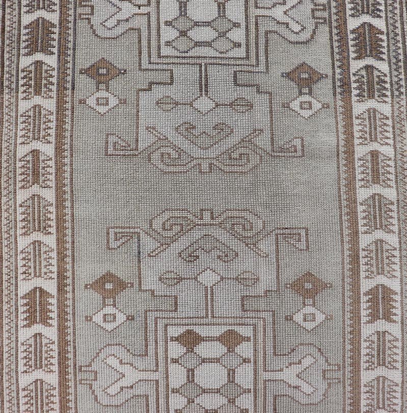 Measures: 2'10 x 10'0 Vintage Turkish Oushak Runner in Neutral Tones, Taupe, Gray, Cream, and Brown. Keivan Woven Arts / rug EN - 179108, country of origin / type: Turkey / Oushak, circa mid - 20th. This vintage Oushak carpet from mid - 20th century T... - Keivan Woven ArtsEN - 179108 - 21943Rug