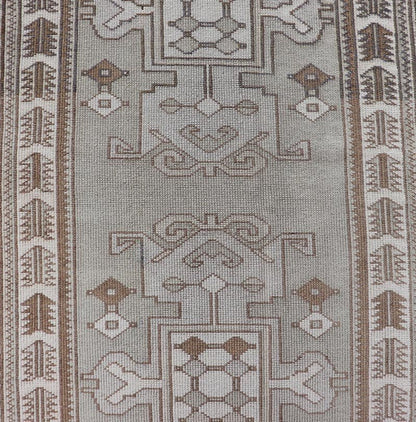 Measures: 2'10 x 10'0 Vintage Turkish Oushak Runner in Neutral Tones, Taupe, Gray, Cream, and Brown. Keivan Woven Arts / rug EN - 179108, country of origin / type: Turkey / Oushak, circa mid - 20th. This vintage Oushak carpet from mid - 20th century T... - Keivan Woven ArtsEN - 179108 - 21943Rug