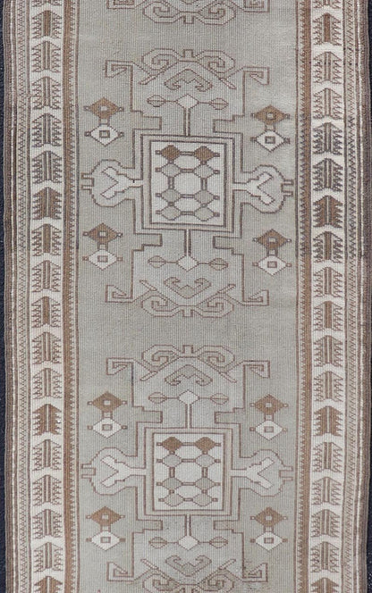 Measures: 2'10 x 10'0 Vintage Turkish Oushak Runner in Neutral Tones, Taupe, Gray, Cream, and Brown. Keivan Woven Arts / rug EN - 179108, country of origin / type: Turkey / Oushak, circa mid - 20th. This vintage Oushak carpet from mid - 20th century T... - Keivan Woven ArtsEN - 179108 - 21943Rug