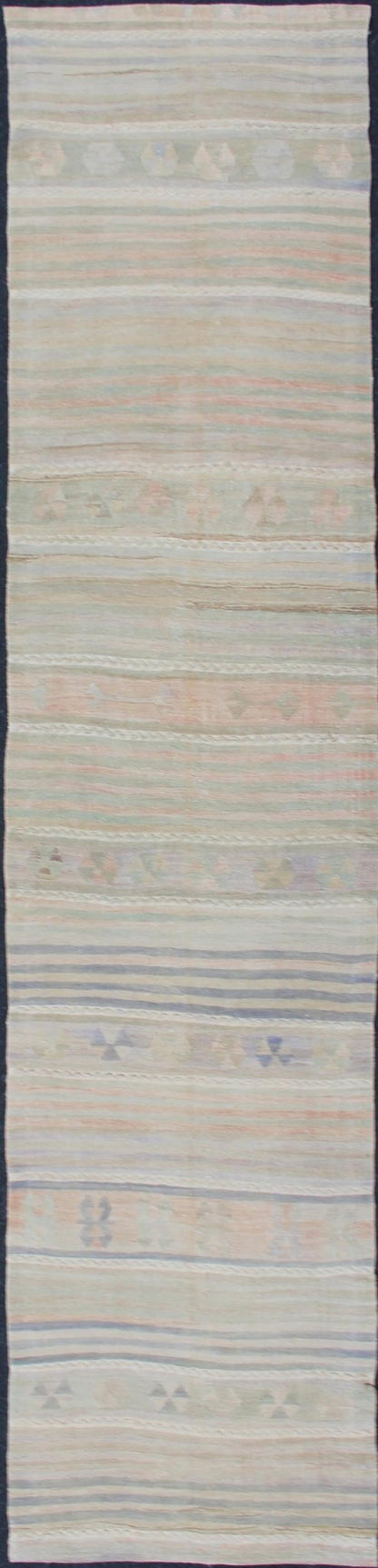 Vintage Turkish Kilim Runner with Soft Stripes and Modern Design in Muted Colors Vintage Turkish Kilim runner with a stripe and modern design in taupe, light pink, light green, slight blue tones and neutrals. Minimalist stripe design Kilim runne... - Keivan Woven ArtsEN - 179340 - 12006Rug