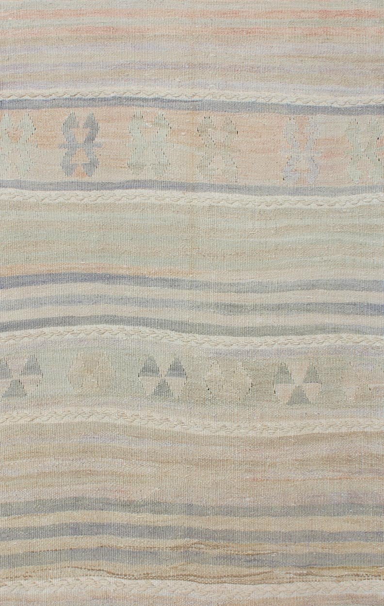 Vintage Turkish Kilim Runner with Soft Stripes and Modern Design in Muted Colors Vintage Turkish Kilim runner with a stripe and modern design in taupe, light pink, light green, slight blue tones and neutrals. Minimalist stripe design Kilim runne... - Keivan Woven ArtsEN - 179340 - 12006Rug