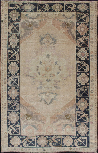 Vintage Turkish Oushak Rug in Tan & Navy Blue. Vintage Oushak Rug in Tan & Navy Blue With Floral Medallion Design and Sub Geometric Border in boteh and botanical motifs. Keivan Woven Arts/ rug EN - 179353, country of origin / type: Turkey / Ousha... - Keivan Woven ArtsEN - 179353 - 12357Rug