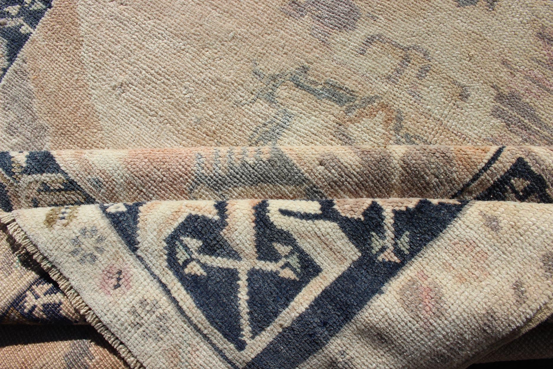 Vintage Turkish Oushak Rug in Tan & Navy Blue. Vintage Oushak Rug in Tan & Navy Blue With Floral Medallion Design and Sub Geometric Border in boteh and botanical motifs. Keivan Woven Arts/ rug EN - 179353, country of origin / type: Turkey / Ousha... - Keivan Woven ArtsEN - 179353 - 12357Rug