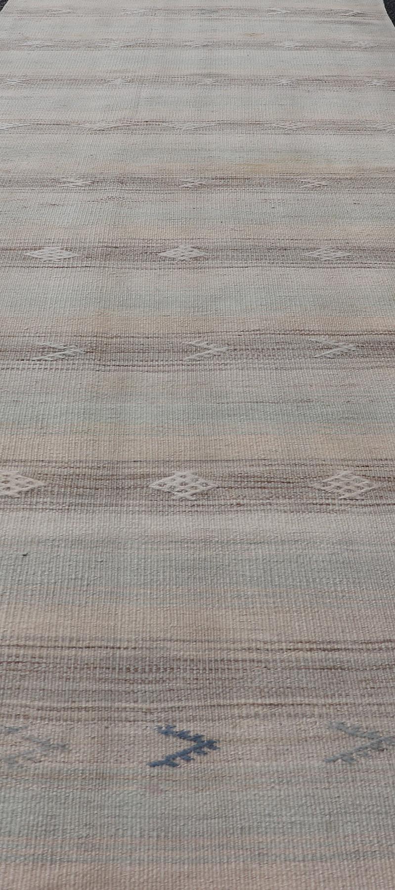 Vintage Turkish Kilim Runner with Horizontal Stripes and Tribal Motifs Vintage Kilim Runner, rug EN - 179377, country of origin / type: Turkey / Kilim, circa Mid - 20th Century. Measures: 2'8 x 10'10. - Keivan Woven ArtsEN - 179377 - 18601Rug