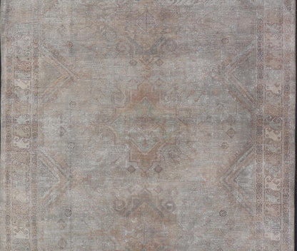 Antique Khotan Rug in Medallions with Silvery Background and Muted Colors. Keivan Woven Arts / rug EN - 179399, country of origin / type: Turkestan / Khotan, 1900 Measures: 8'0 x 10'6 This attractive Khotan rug is a spectacular testament to the co... - Keivan Woven ArtsEN - 179399 - 23696Rug