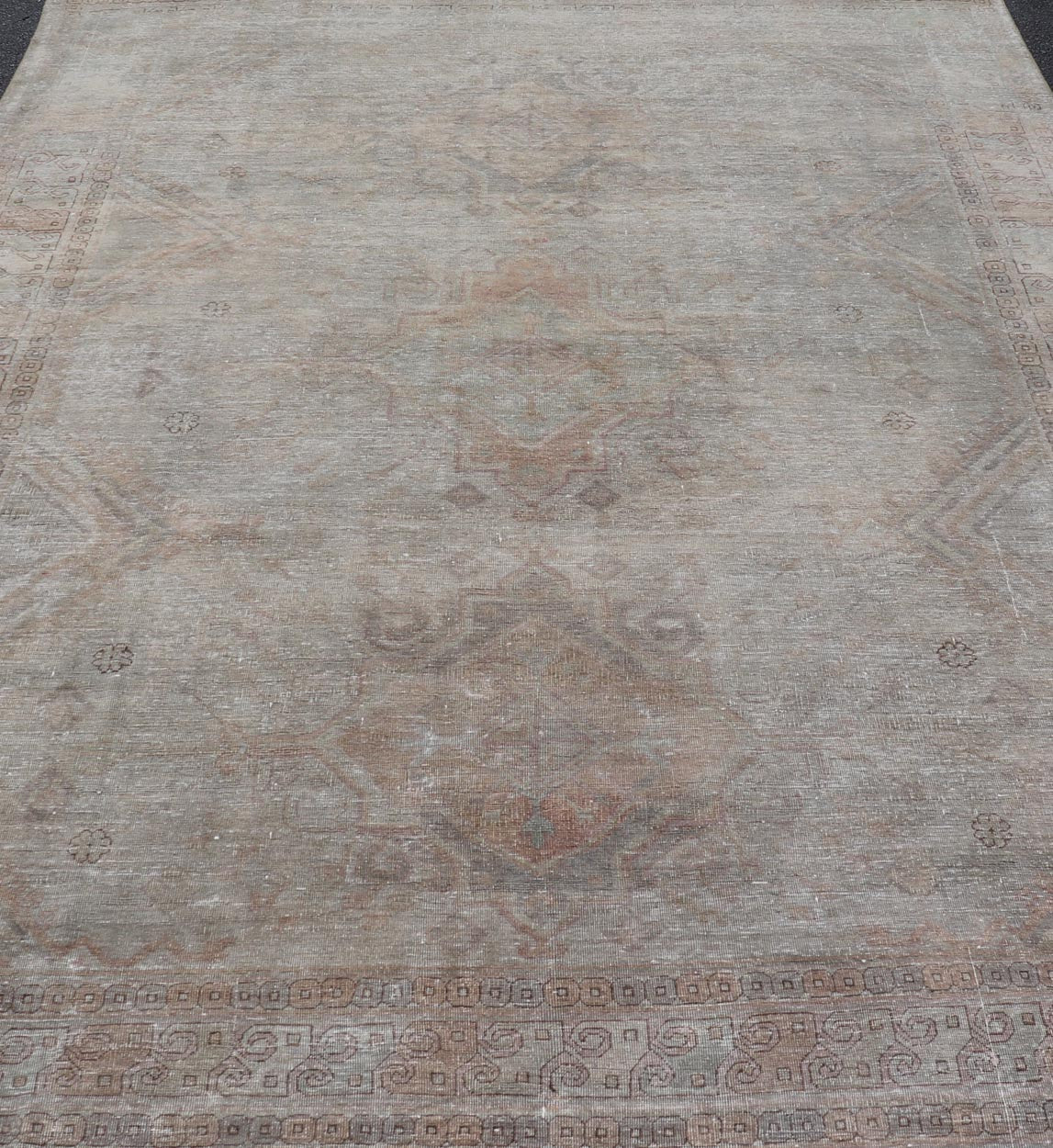 Antique Khotan Rug in Medallions with Silvery Background and Muted Colors. Keivan Woven Arts / rug EN - 179399, country of origin / type: Turkestan / Khotan, 1900 Measures: 8'0 x 10'6 This attractive Khotan rug is a spectacular testament to the co... - Keivan Woven ArtsEN - 179399 - 23696Rug