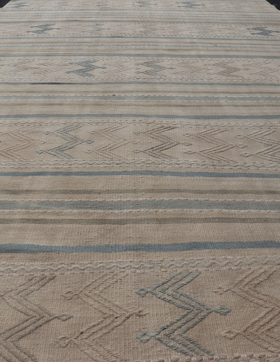 Turkish Vintage Kilim With Embroidered Motifs in Light Tan, Blue L. Brown Keivan Woven Arts / rug EN - 179451, country of origin / type: Turkey / Kilim, circa 1950 This flat - woven Kilim from Turkey features an enticing composition consisting of st... - Keivan Woven ArtsEN - 179451 - 17580Rug