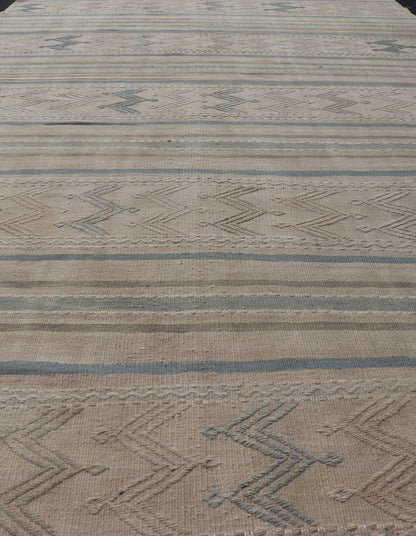 Turkish Vintage Kilim With Embroidered Motifs in Light Tan, Blue L. Brown Keivan Woven Arts / rug EN - 179451, country of origin / type: Turkey / Kilim, circa 1950 This flat - woven Kilim from Turkey features an enticing composition consisting of st... - Keivan Woven ArtsEN - 179451 - 17580Rug