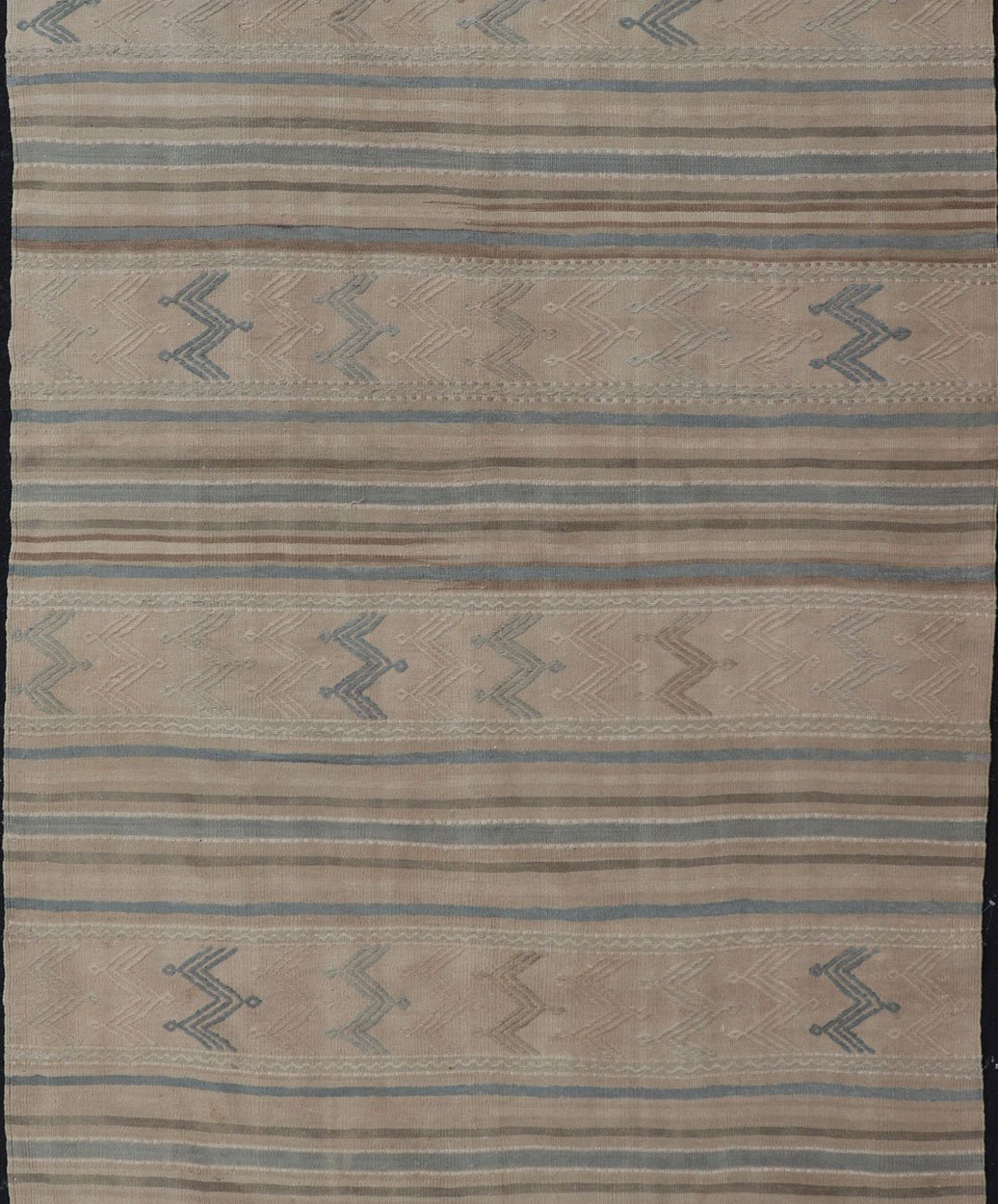 Turkish Vintage Kilim With Embroidered Motifs in Light Tan, Blue L. Brown Keivan Woven Arts / rug EN - 179451, country of origin / type: Turkey / Kilim, circa 1950 This flat - woven Kilim from Turkey features an enticing composition consisting of st... - Keivan Woven ArtsEN - 179451 - 17580Rug
