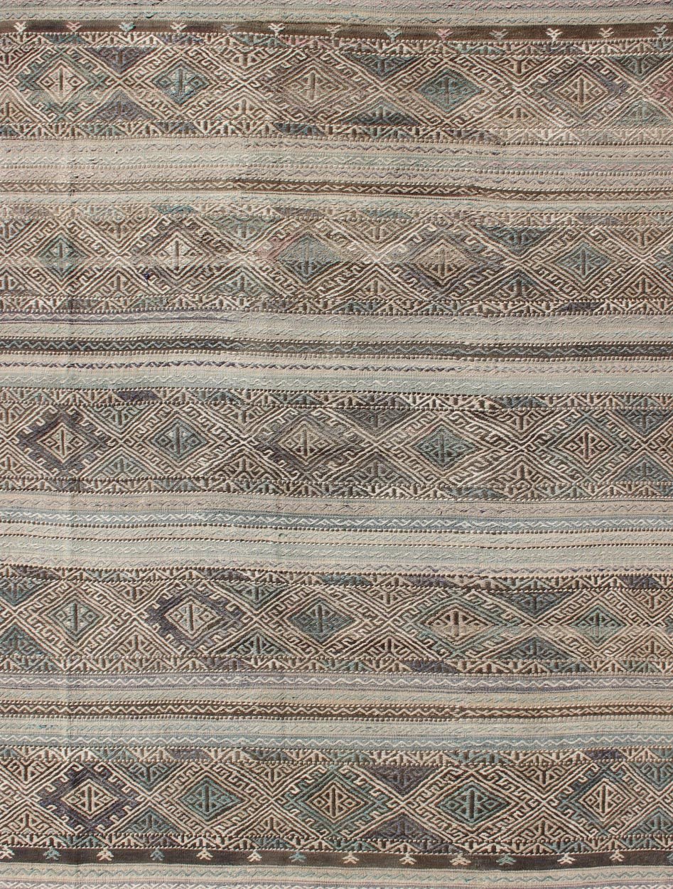Flat - Weave Turkish Vintage Kilim With Embroideries in Taupe, Green, Teal, Blue and Brown Vintage flat - weave Kilim with embroideries with a modern design in tan, brown, green and blue geometric stripe design Vintage Kilim from Turkey, Keivan W... - Keivan Woven ArtsEN - 179526 - 11737Rug