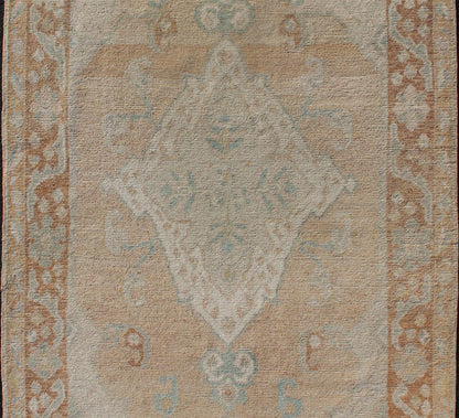 Muted Colored Turkish Oushak Rug is Subdued Medallion Design Nice Vintage Turkish Oushak rug wit an understated medallion with flowers and geometric motifs, rug EN - 179557, country of origin / type: Turkey / Oushak, circa 1940 This magnifice... - Keivan Woven ArtsEN - 179557 - 12411Rug