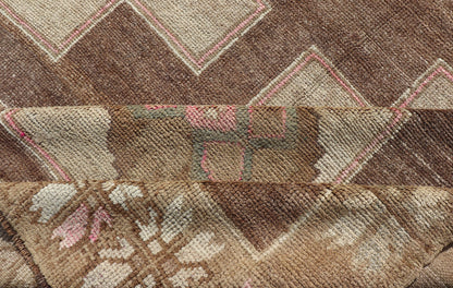 Vintage Kars Wide Gallery Rug in Brown Colors, Tan, Taupe and Light Green. Stacked in two rows of geometric medallions, this Vintage Turkish Kars wide gallery runner displays great geometry in chocolate Brown background with Colors such as Tan,... - Keivan Woven ArtsEN - 179569 - 14374Rug