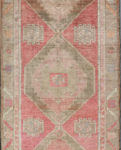 Long Gallery Turkish Vintage Runner with Medallion Design in Green, Pink. Vintage wide and long gallery runner from Turkey with geometric Medallion design in various tones of pink, coral, tan and variety of beautiful green colors, rug EN - 179586... - Keivan Woven ArtsEN - 179586 - 14378Rug
