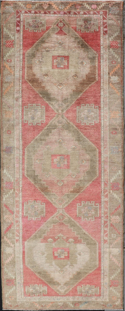 Long Gallery Turkish Vintage Runner with Medallion Design in Green, Pink. Vintage wide and long gallery runner from Turkey with geometric Medallion design in various tones of pink, coral, tan and variety of beautiful green colors, rug EN - 179586... - Keivan Woven ArtsEN - 179586 - 14378Rug