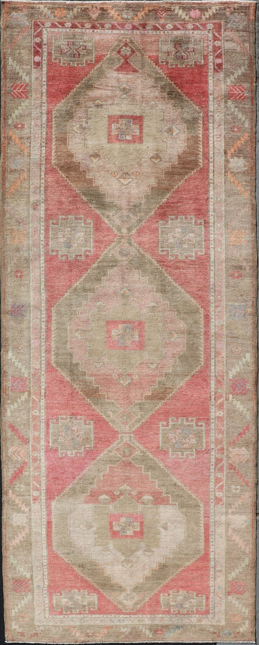 Long Gallery Turkish Vintage Runner with Medallion Design in Green, Pink. Vintage wide and long gallery runner from Turkey with geometric Medallion design in various tones of pink, coral, tan and variety of beautiful green colors, rug EN - 179586... - Keivan Woven ArtsEN - 179586 - 14378Rug