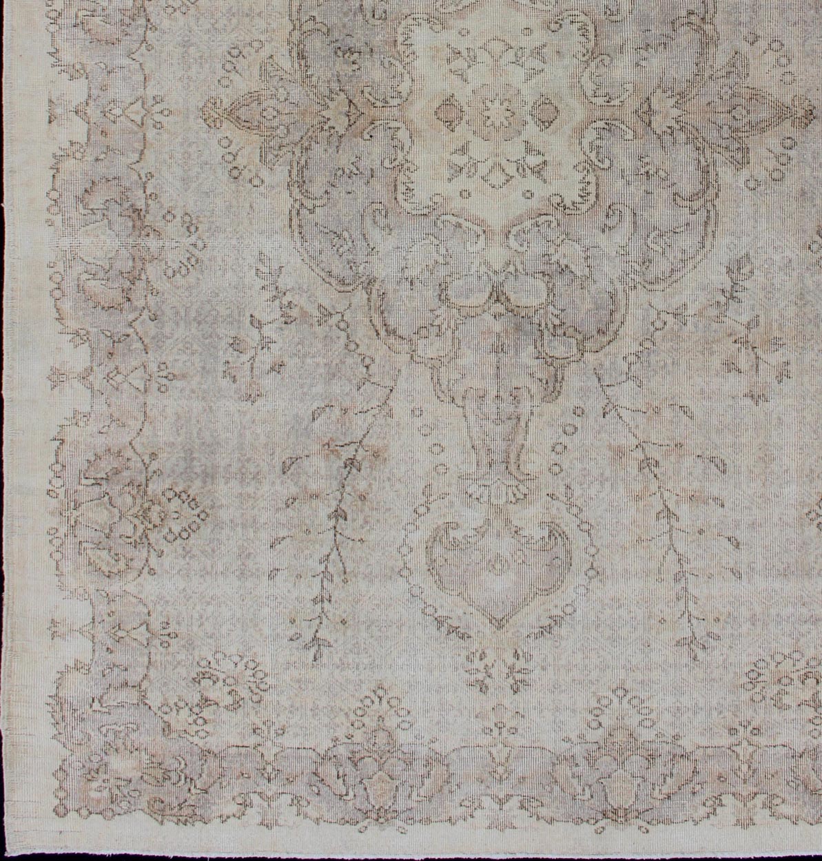 Keivan Woven Arts Vintage Turkish Distressed Rug in Sand, Cream, lavender, Taupe with brown highlights Measures:6'7 x 10'5 Sand, Taupe, cream and light lavender distressed vintage rug from Turkey with medallion design of etched motifs, ... - Keivan Woven ArtsEN - 179640 - 12627Rug