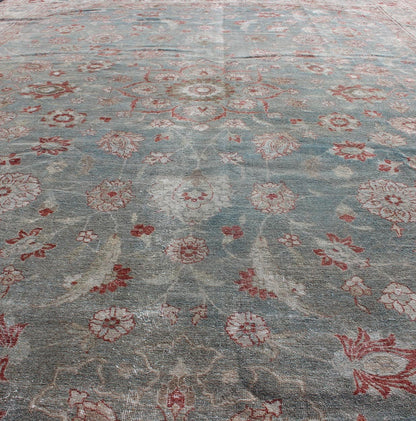 Antique Persian Tabriz Rug with Floral Medallion Design in Red and Blue kwarugs Red and blue antique Persian Tabriz rug with flowers and medallion, rug en - 179642, country of origin / type: Iran / Tabriz, circa 1920. This sublime and ench... - Keivan Woven ArtsEN - 179642 - 12415Rug