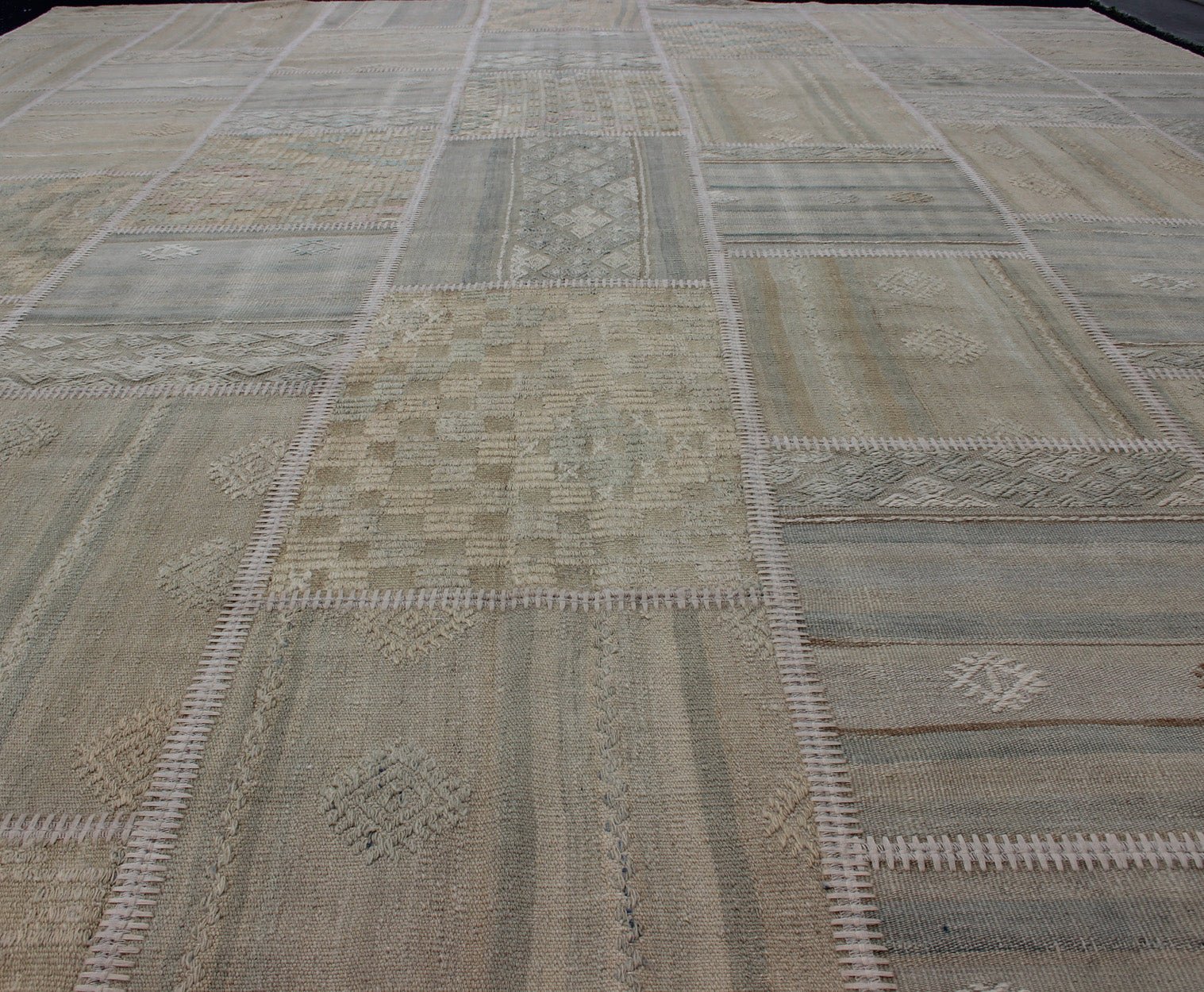 Large Turkish Kilim in Tan, Blue, Taupe, Light Green & Neutral Colors Large Turkish kilim from vintage pieces skillfully put together. this fine patchwork rug has light green, tan, taupe, blue, cream, brown and neutral tones. Keivan Woven Arts rug/... - Keivan Woven ArtsEN - 179675 - 12803Rug
