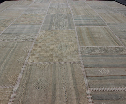 Large Turkish Kilim in Tan, Blue, Taupe, Light Green & Neutral Colors Large Turkish kilim from vintage pieces skillfully put together. this fine patchwork rug has light green, tan, taupe, blue, cream, brown and neutral tones. Keivan Woven Arts rug/... - Keivan Woven ArtsEN - 179675 - 12803Rug