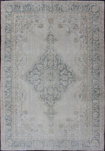 Medallion Distressed Oushak Turkey in Cream and Stone Blue Taupe, cream and blue Oushak rug vintage from Turkey with medallion design of etched motifs, rug EN - 179688, country of origin / type: Turkey / Oushak, circa 1950. This striking v... - Keivan Woven ArtsEN - 179688 - 12791Rug