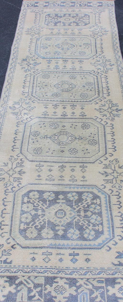 Vintage Turkish Oushak Runner in Faded Blue in Neutral Background Oushak vintage rug from Turkey with medallion design, rug EN - 179700, country of origin / type: Turkey / Oushak, circa 1940. This vintage Turkish Oushak rug features a multi... - Keivan Woven ArtsEN - 179700 - 12553Rug