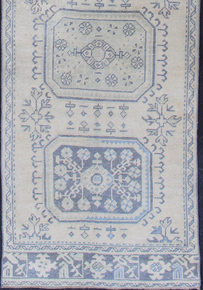 Vintage Turkish Oushak Runner in Faded Blue in Neutral Background Oushak vintage rug from Turkey with medallion design, rug EN - 179700, country of origin / type: Turkey / Oushak, circa 1940. This vintage Turkish Oushak rug features a multi... - Keivan Woven ArtsEN - 179700 - 12553Rug