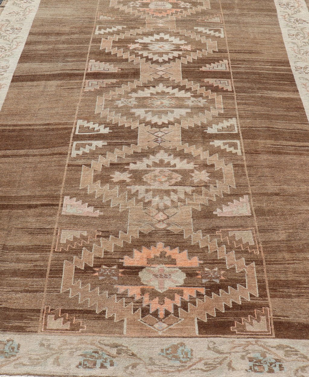 Vintage Turkish Kars Rug in Brown Background with unique row of Medallions. Brown background Vintage Turkish Kars Rug in Mocha, ivory, brown, pale green, cream and taupe, Keivan Woven Arts/ rug/ EN - 179779, country of origin / type: Turkey / Ous... - Keivan Woven ArtsEN - 179779 - 14382Rug