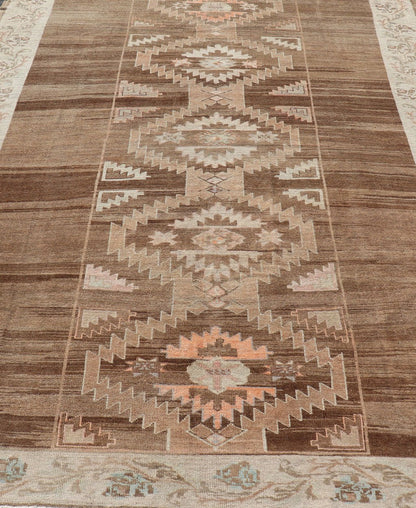 Vintage Turkish Kars Rug in Brown Background with unique row of Medallions. Brown background Vintage Turkish Kars Rug in Mocha, ivory, brown, pale green, cream and taupe, Keivan Woven Arts/ rug/ EN - 179779, country of origin / type: Turkey / Ous... - Keivan Woven ArtsEN - 179779 - 14382Rug