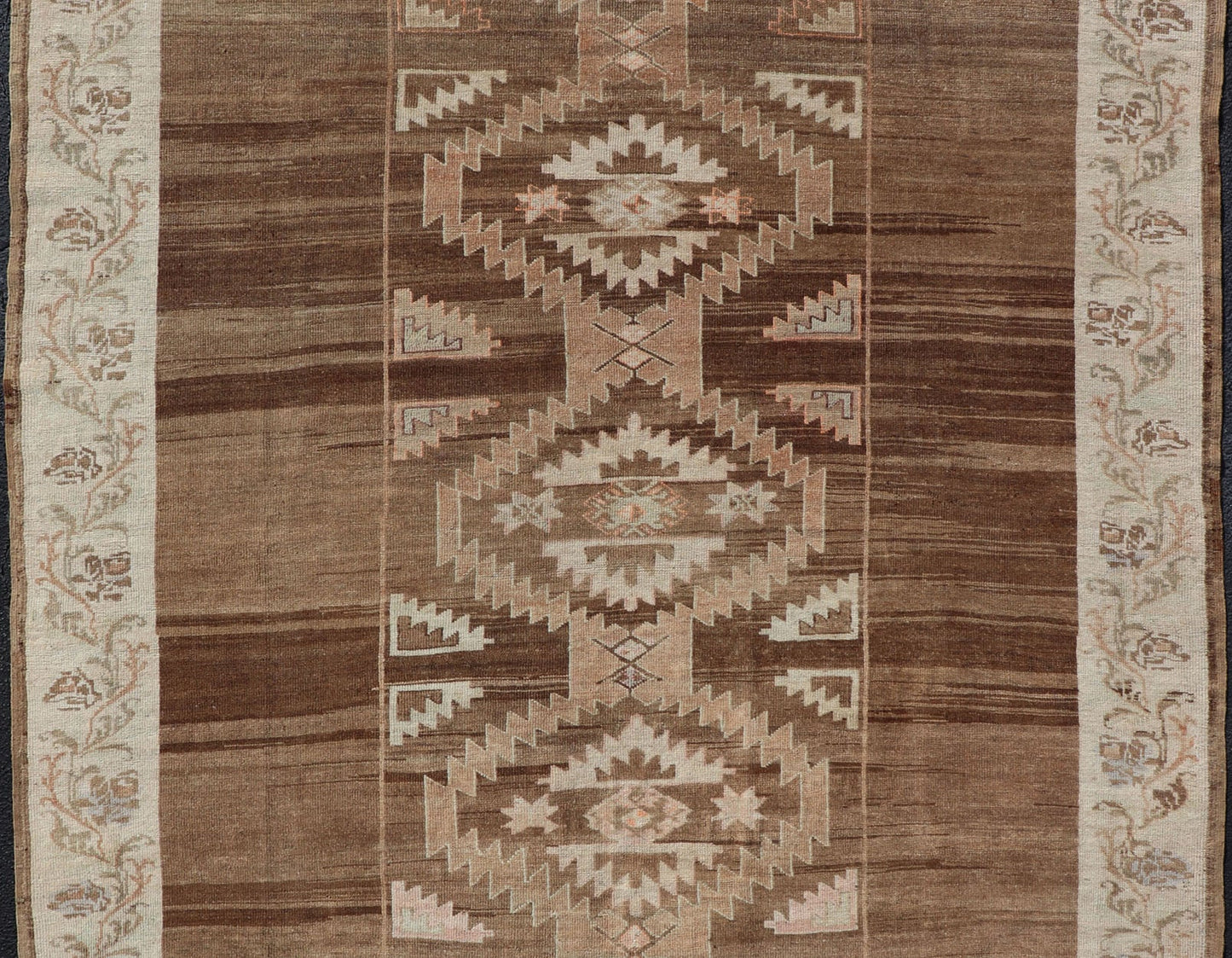 Vintage Turkish Kars Rug in Brown Background with unique row of Medallions. Brown background Vintage Turkish Kars Rug in Mocha, ivory, brown, pale green, cream and taupe, Keivan Woven Arts/ rug/ EN - 179779, country of origin / type: Turkey / Ous... - Keivan Woven ArtsEN - 179779 - 14382Rug