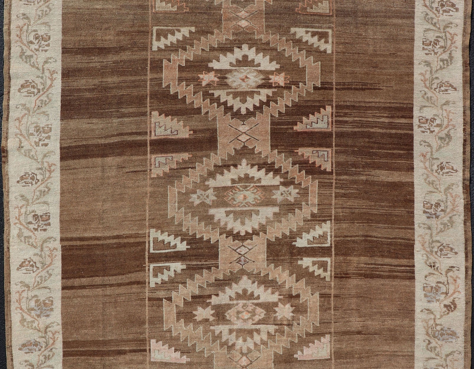 Vintage Turkish Kars Rug in Brown Background with unique row of Medallions. Brown background Vintage Turkish Kars Rug in Mocha, ivory, brown, pale green, cream and taupe, Keivan Woven Arts/ rug/ EN - 179779, country of origin / type: Turkey / Ous... - Keivan Woven ArtsEN - 179779 - 14382Rug