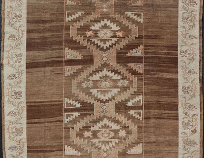 Vintage Turkish Kars Rug in Brown Background with unique row of Medallions. Brown background Vintage Turkish Kars Rug in Mocha, ivory, brown, pale green, cream and taupe, Keivan Woven Arts/ rug/ EN - 179779, country of origin / type: Turkey / Ous... - Keivan Woven ArtsEN - 179779 - 14382Rug
