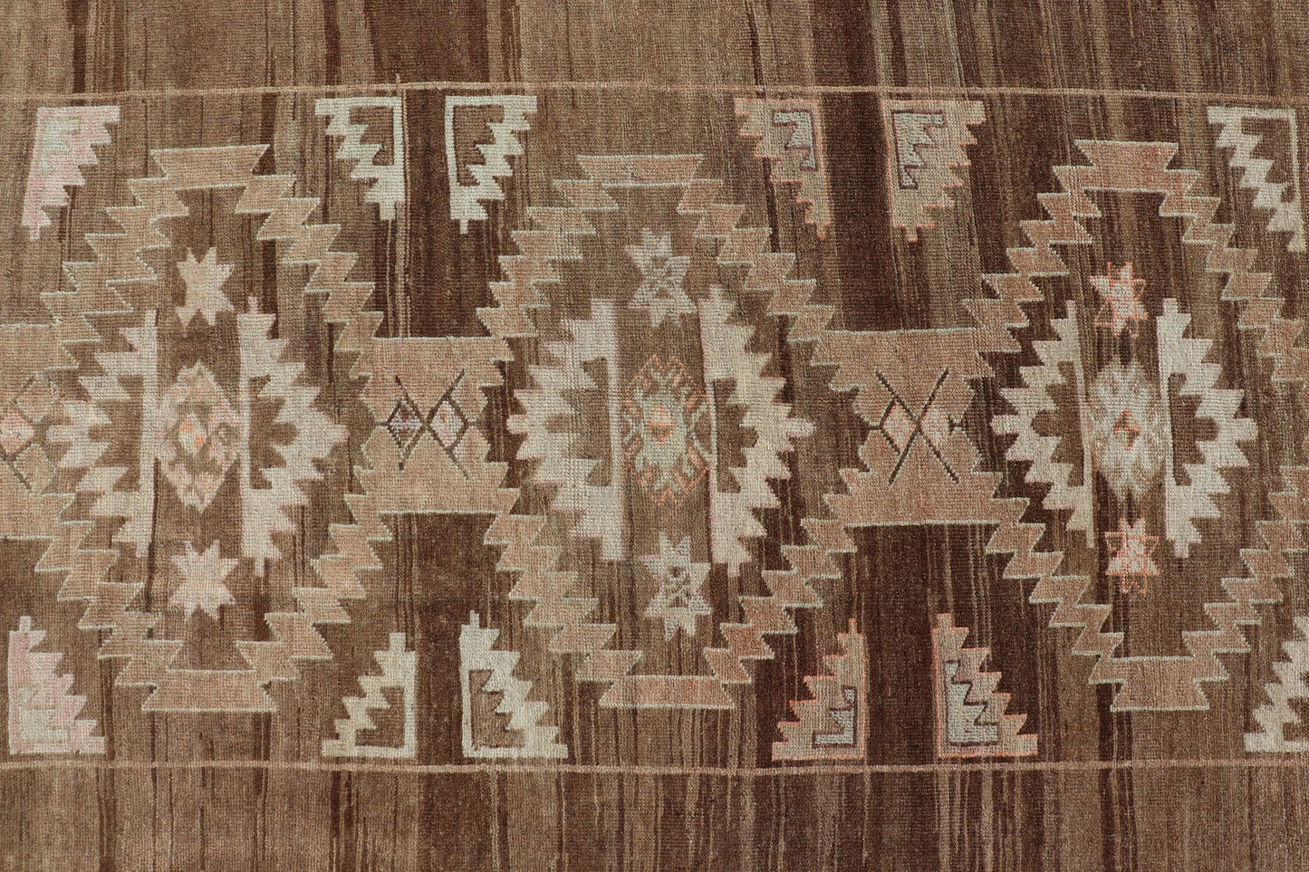 Vintage Turkish Kars Rug in Brown Background with unique row of Medallions. Brown background Vintage Turkish Kars Rug in Mocha, ivory, brown, pale green, cream and taupe, Keivan Woven Arts/ rug/ EN - 179779, country of origin / type: Turkey / Ous... - Keivan Woven ArtsEN - 179779 - 14382Rug