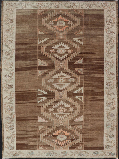 Vintage Turkish Kars Rug in Brown Background with unique row of Medallions. Brown background Vintage Turkish Kars Rug in Mocha, ivory, brown, pale green, cream and taupe, Keivan Woven Arts/ rug/ EN - 179779, country of origin / type: Turkey / Ous... - Keivan Woven ArtsEN - 179779 - 14382Rug