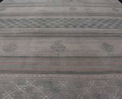 Square Vintage Turkish Kilim rug with horizontal stripes and tribal shapes. Keivan Woven Arts / rug EN - 179781, country of origin / type: Turkey / Kilim, circa mid - 20th century This flat - woven Kilim from Turkey features an enticing composition co... - Keivan Woven ArtsEN - 179781 - 17646Rug