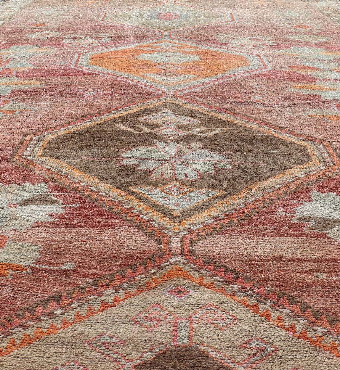 Long Rug, Vintage Turkish Gallery Rug with Tribal Design in Variegated Red. Turkish tribal design colorful gallery runner in soft red and multi colors, rug EN - 179883, country of origin / type: Turkey / Oushak, circa 1930 This expansive G... - Keivan Woven ArtsEN - 179883 - 14254Rug