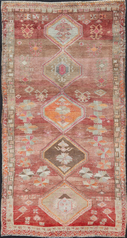 Long Rug, Vintage Turkish Gallery Rug with Tribal Design in Variegated Red. Turkish tribal design colorful gallery runner in soft red and multi colors, rug EN - 179883, country of origin / type: Turkey / Oushak, circa 1930 This expansive G... - Keivan Woven ArtsEN - 179883 - 14254Rug