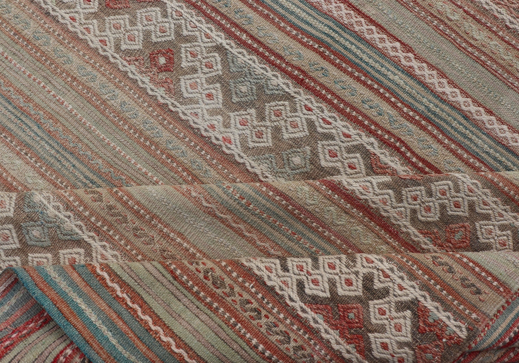 Muted Colored Vintage Embroidered Kilim with Stripes and alternating Geometric motifs. Geometric stripe design Kilim runner in multi - colors in muted tones, rug EN - 179892, country of origin / type: Turkey / Kilim, circa 1950 This vintage K... - Keivan Woven ArtsEN - 179892 - 14500Rug
