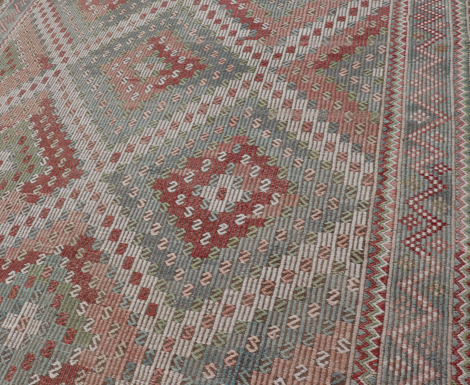 Colorful Vintage Turkish Embroidered Flat - Weave in Diamond Design. Keivan Woven Arts / rug / EN - 179894 country of origin / type: Turkey / Kilim, circa 1950 Measures: 7'0 x 10'5 Rendered in diamond shapes with a spotted and speckled assortment of... - Keivan Woven ArtsEN - 179894 - 15406Rug