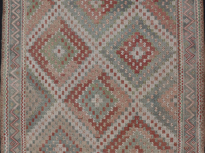 Colorful Vintage Turkish Embroidered Flat - Weave in Diamond Design. Keivan Woven Arts / rug / EN - 179894 country of origin / type: Turkey / Kilim, circa 1950 Measures: 7'0 x 10'5 Rendered in diamond shapes with a spotted and speckled assortment of... - Keivan Woven ArtsEN - 179894 - 15406Rug