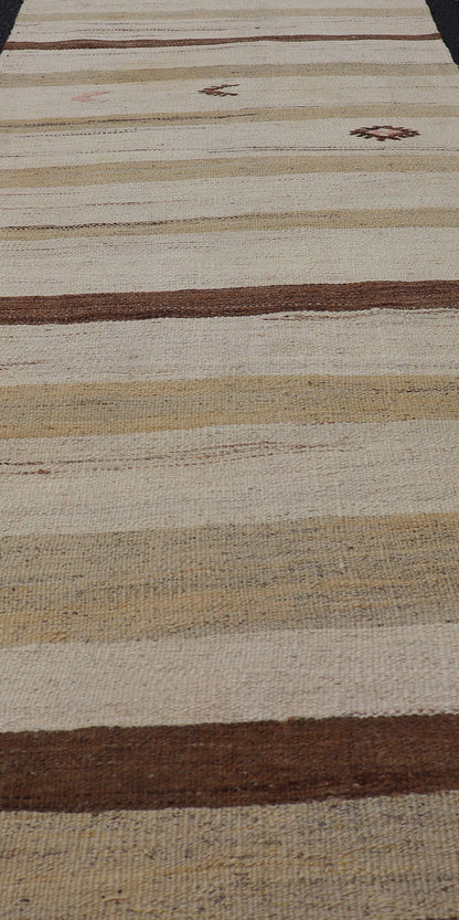 Minimalist design with traces of stripes Kilim runner in cream, light brown and taupe, Keivan Woven Arts / rug EN - 179919, country of origin / type: Turkey / Kilim, circa 1950 This flat - woven Kilim runner from Turkey features an understated compo... - Keivan Woven ArtsEN - 179919 - 17796Rug